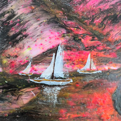 Small painting of sail boats at sunset